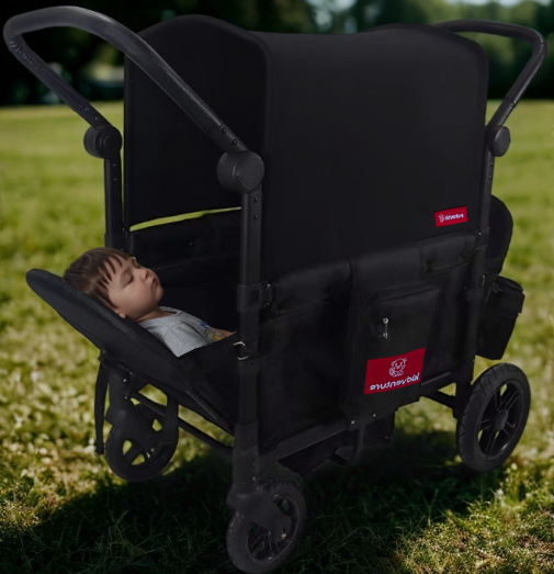 Boy napping in the Arkonno stroller wagon in the park